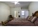 Primary bedroom offering good natural light, carpet, and mirrored closet doors at 880 W Moon Shadow Dr, Casa Grande, AZ 85122