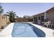 Beautiful in-ground swimming pool with patio and desert landscaping at 880 W Moon Shadow Dr, Casa Grande, AZ 85122