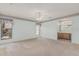 Primary bedroom with carpet floors, neutral walls and a doorway to the bathroom at 11529 E Lindner Ave, Mesa, AZ 85209
