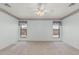 Large bedroom featuring neutral walls, carpet flooring and windows for natural light at 11529 E Lindner Ave, Mesa, AZ 85209