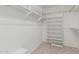 Spacious walk-in closet featuring built-in shelving and ample storage space, perfect for organization at 11529 E Lindner Ave, Mesa, AZ 85209