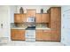 Modern kitchen with stainless appliances, granite counters, and generous storage for culinary enthusiasts at 14575 W Mountain View Blvd # 11212, Surprise, AZ 85374