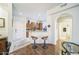 Open floor plan with bar seating that overlooks the kitchen, providing additional space for entertaining at 14575 W Mountain View Blvd # 11212, Surprise, AZ 85374