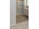 Bathroom featuring a glass enclosed shower and tile floors at 14870 W Encanto Blvd # 1106, Goodyear, AZ 85395