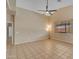 Bright and airy living room with tile floors, vaulted ceilings, and plenty of natural light, creating a comfortable atmosphere at 16040 W Grant St, Goodyear, AZ 85338