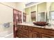Bathroom features a single sink with wood countertop and a tub/shower combo at 16817 W Bradford Way, Surprise, AZ 85374