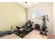 Home gym featuring weightlifting and cardio equipment at 16817 W Bradford Way, Surprise, AZ 85374