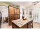 Kitchen island with granite countertop and wooden cabinets, offering both style and functionality at 16817 W Bradford Way, Surprise, AZ 85374