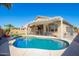 Sparkling pool featuring a patio and covered seating, creating the perfect backyard oasis for relaxing and entertaining at 16817 W Bradford Way, Surprise, AZ 85374