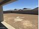Spacious, enclosed backyard with room for landscaping and outdoor entertaining at 17747 W Brown St, Waddell, AZ 85355