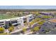 Aerial view of Topgolf complex, parking lot and surrounding landscape at 1814 E Bridgeport Pkwy # 103, Gilbert, AZ 85295