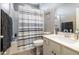 Bathroom with white vanity and shower, ideal for everyday convenience at 1814 E Bridgeport Pkwy # 103, Gilbert, AZ 85295