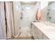 Bathroom features a modern tiled shower and ample storage space at 1814 E Bridgeport Pkwy # 103, Gilbert, AZ 85295