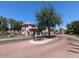 Welcoming gated entrance to the community, with meticulously maintained landscaping and a secure entry system at 1814 E Bridgeport Pkwy # 103, Gilbert, AZ 85295
