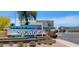 San Tan Village sign with nearby businesses and landscaping at 1814 E Bridgeport Pkwy # 103, Gilbert, AZ 85295