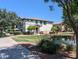 Inviting townhome with charming landscaping and lake view, set in a peaceful community at 1814 E Bridgeport Pkwy # 103, Gilbert, AZ 85295