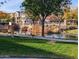 A serene pond with ducks and geese in a well-maintained community and walking paths at 1814 E Bridgeport Pkwy # 103, Gilbert, AZ 85295