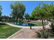 A scenic pond provides a tranquil atmosphere with lush greenery and walking paths at 1814 E Bridgeport Pkwy # 103, Gilbert, AZ 85295