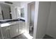 Bathroom vanity with marble counters and a toilet room on the right at 1820 N Thornton Rd # 917, Casa Grande, AZ 85122