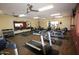 Well-equipped gym with modern treadmills, elliptical machines, weights and mirrored wall at 1820 N Thornton Rd # 917, Casa Grande, AZ 85122