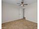 Bedroom featuring tile flooring and an attached ensuite for added convenience at 19443 N 36Th St, Phoenix, AZ 85050