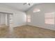 Bright bedroom with tile flooring, large window, vaulted ceilings, and neutral paint at 19443 N 36Th St, Phoenix, AZ 85050