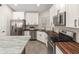Modern kitchen with stainless steel appliances and bright natural lighting at 19443 N 36Th St, Phoenix, AZ 85050