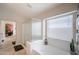 Ensuite bathroom with soaking tub, glass shower, tiled floors, and access to the main bedroom at 2 W Pasture Canyon Dr, San Tan Valley, AZ 85143