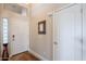 Bright foyer with white door, tile floor and view of clerestory window at 2 W Pasture Canyon Dr, San Tan Valley, AZ 85143