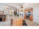 Bright kitchen features stainless appliances, center island, and open floor plan to the living area at 2 W Pasture Canyon Dr, San Tan Valley, AZ 85143