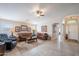 Open concept living room with tile floors, ceiling fan, and neutral decor at 2 W Pasture Canyon Dr, San Tan Valley, AZ 85143