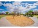 Community playground with swings, a slide, and a covered seating area, perfect for families and children to enjoy at 2 W Pasture Canyon Dr, San Tan Valley, AZ 85143