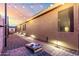 Charming backyard with cozy patio, string lights, and game area; perfect for gatherings at 2024 E Cherry Hills Pl, Chandler, AZ 85249