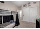 Bedroom featuring bunk beds, a closet, neutral colors, and carpet flooring at 2024 E Cherry Hills Pl, Chandler, AZ 85249