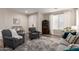 Comfortable living room features a neutral color scheme and a view of the entryway at 2024 E Cherry Hills Pl, Chandler, AZ 85249