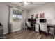 Office with hardwood flooring, natural light, window coverings, and dual workstations at 2024 E Cherry Hills Pl, Chandler, AZ 85249