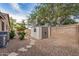 Low-maintenance backyard featuring desert landscaping, a shed, and block-wall fencing for added privacy at 2112 E Yellowstone Pl Pl, Chandler, AZ 85249
