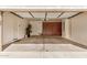 Spacious garage with storage cabinets and ample space for vehicles and equipment at 2112 E Yellowstone Pl Pl, Chandler, AZ 85249