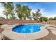 Sparkling pool and spa combination with a waterfall feature and an outdoor lounge area, perfect for relaxing at 2112 E Yellowstone Pl Pl, Chandler, AZ 85249