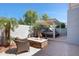 Backyard with fire pit, outdoor furniture, and pergola-covered daybed at 21134 W Green St, Buckeye, AZ 85396