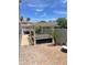 Beautiful outdoor space featuring a modern pergola covered hot tub surrounded by desert landscaping at 21134 W Green St, Buckeye, AZ 85396