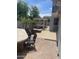 Inviting backyard featuring a spa, outdoor bar, and desert landscaping, perfect for entertaining at 21134 W Green St, Buckeye, AZ 85396
