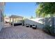 Backyard features outdoor seating and a pergola covering an outdoor daybed at 21134 W Green St, Buckeye, AZ 85396