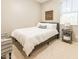 Cozy bedroom features a comfortable bed, a side chair, and natural lighting at 21134 W Green St, Buckeye, AZ 85396