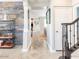 Entryway with modern rustic decorations and view to dining room at 21134 W Green St, Buckeye, AZ 85396