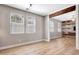 Bright living space with wood floors, large windows, and an open layout, perfect for entertaining at 21134 W Green St, Buckeye, AZ 85396