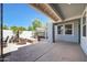 Beautiful outdoor living space featuring a fire pit, patio furniture, and covered spa at 21134 W Green St, Buckeye, AZ 85396