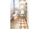Simple powder room with modern vanity and fixtures, and a stylish mirror, bathed in natural light at 21134 W Green St, Buckeye, AZ 85396