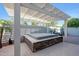 Outdoor spa area with stone accents and shaded pergola for relaxation at 21134 W Green St, Buckeye, AZ 85396