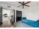 Bright bedroom featuring a ceiling fan, and relaxing chaise lounge at 2170 E Alameda Dr, Tempe, AZ 85282